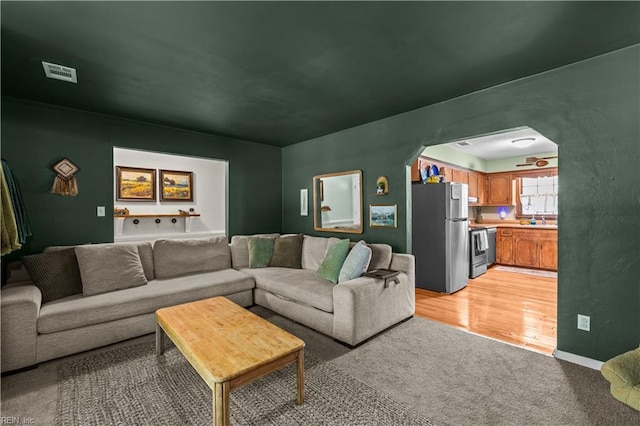 6110 Lyndhurst Ave, Norfolk, VA 23502 - living area featuring arched walkways and light carpet