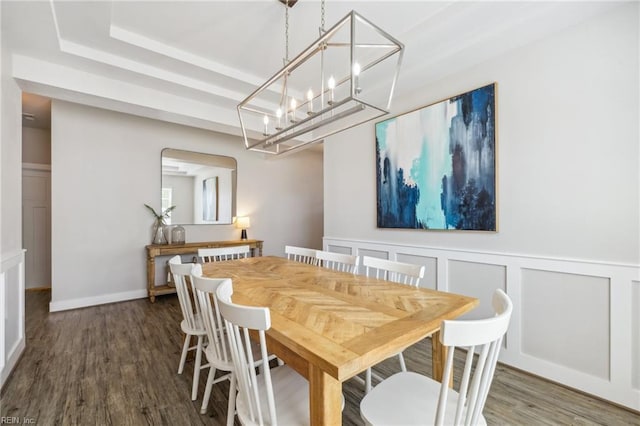 1328 Andreas Ln, Chesapeake, VA 23322 - dining area featuring a chandelier, wood finished floors, wainscoting, a decorative wall, and a tray ceiling