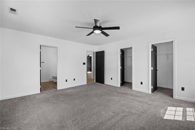 130 Rochdale Ln, Suffolk, VA 23434 - unfurnished bedroom featuring carpet, baseboards, and connected bathroom