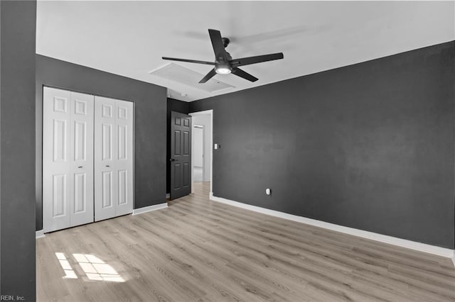 130 Rochdale Ln, Suffolk, VA 23434 - unfurnished bedroom with wood finished floors, baseboards, a closet, and ceiling fan