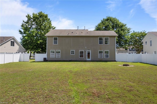 130 Rochdale Ln, Suffolk, VA 23434 - rear view of property with a fire pit