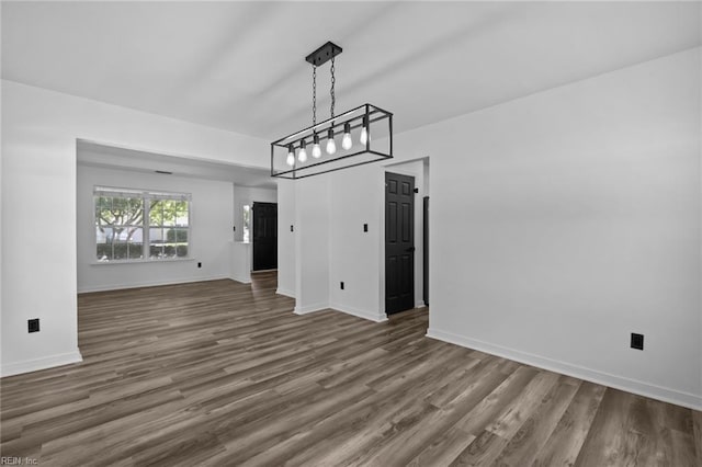 130 Rochdale Ln, Suffolk, VA 23434 - unfurnished dining area with wood finished floors and baseboards