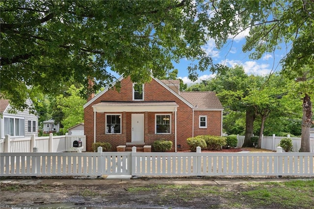 134 Chesterfield Rd, Hampton, VA 23661 - bungalow-style house with brick siding and a fenced front yard