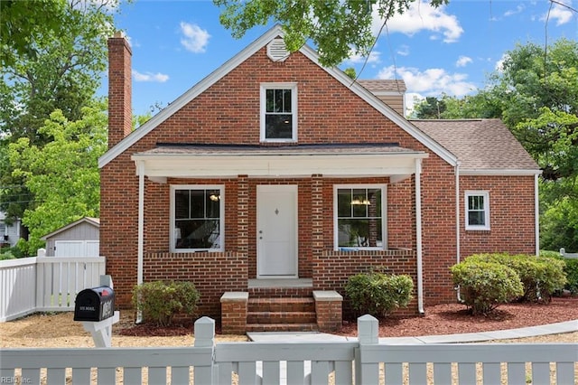 134 Chesterfield Rd, Hampton, VA 23661 - bungalow-style home featuring brick siding, a chimney, and roof with shingles