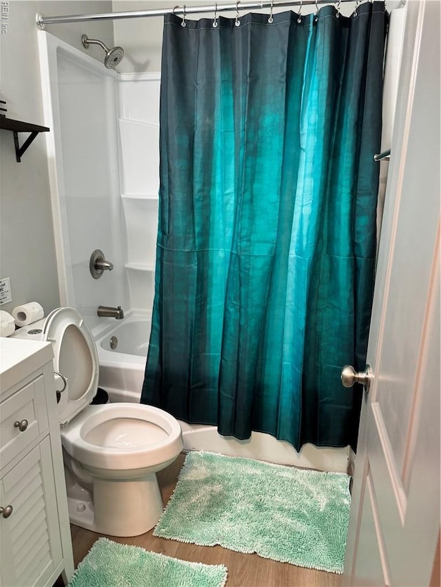 1628 Bourbon Ave, Norfolk, VA 23509 - bathroom with shower / tub combo, vanity, toilet, and wood finished floors
