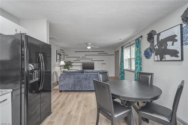 1628 Bourbon Ave, Norfolk, VA 23509 - dining area with a textured ceiling, ceiling fan, and light wood-style floors