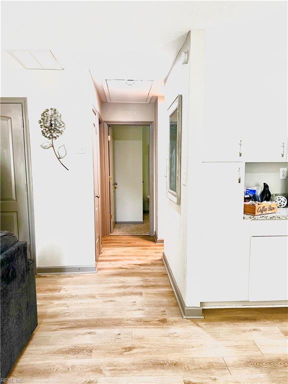 1628 Bourbon Ave, Norfolk, VA 23509 - hallway featuring light wood-style floors and baseboards