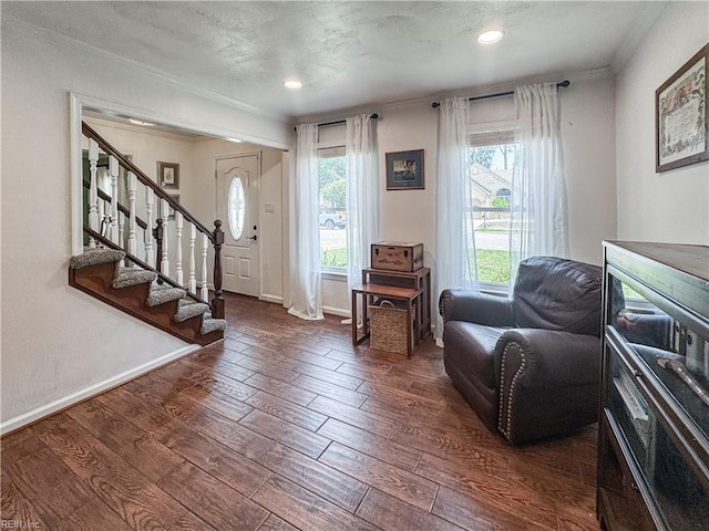1907 Eastborne Dr, Virginia Beach, VA 23454 - foyer entrance featuring ornamental molding, wood finished floors, healthy amount of natural light, stairs, and baseboards
