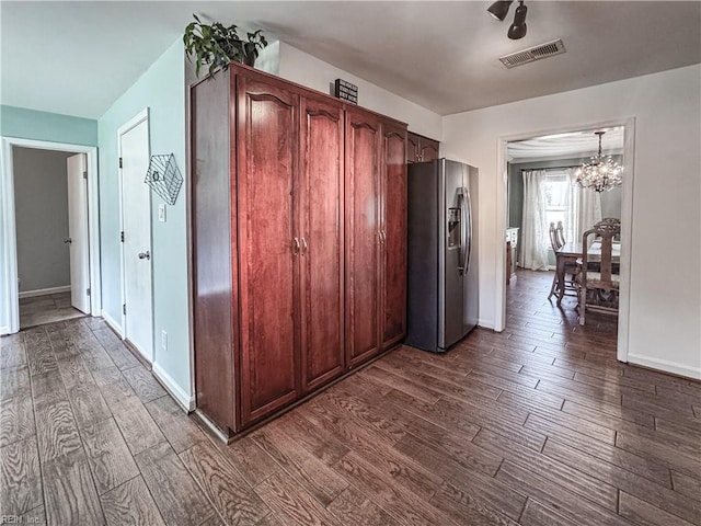 1907 Eastborne Dr, Virginia Beach, VA 23454 - kitchen with stainless steel fridge, dark wood finished floors, a chandelier, and baseboards