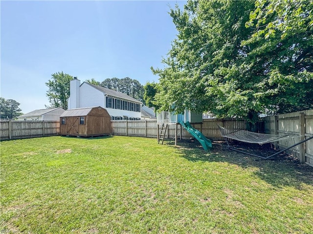 1907 Eastborne Dr, Virginia Beach, VA 23454 - view of yard featuring a playground, a storage unit, and an outdoor structure