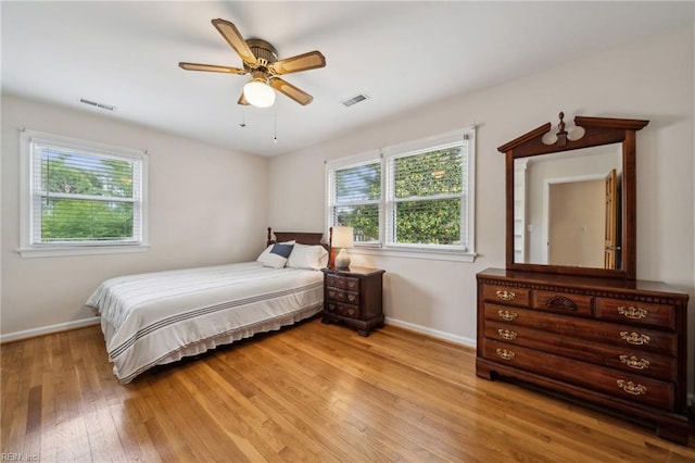 108 Bayview Dr, Yorktown, VA 23692 - bedroom with baseboards, light wood-style flooring, and a ceiling fan