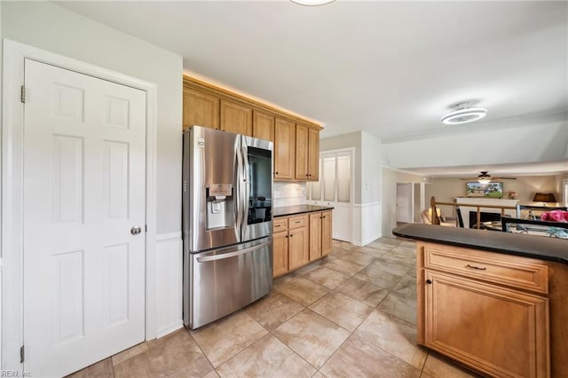 108 Bayview Dr, Yorktown, VA 23692 - kitchen with stainless steel fridge with ice dispenser, dark countertops, a ceiling fan, open floor plan, and brown cabinets