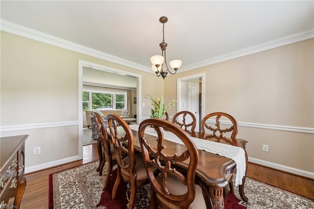 108 Bayview Dr, Yorktown, VA 23692 - dining space featuring ornamental molding, baseboards, and wood finished floors
