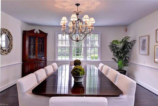 102 Riverside Dr, Newport News, VA 23606 - dining space with wood finished floors, a chandelier, and baseboards