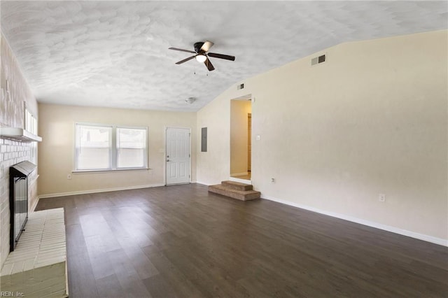2212 Wildwood Rd, Chesapeake, VA 23323 - unfurnished living room featuring vaulted ceiling, a fireplace, a ceiling fan, dark wood-type flooring, and baseboards