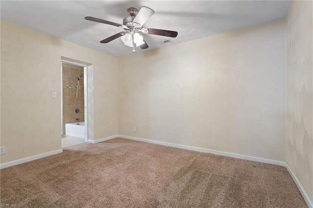 2212 Wildwood Rd, Chesapeake, VA 23323 - spare room with light colored carpet, a ceiling fan, and baseboards
