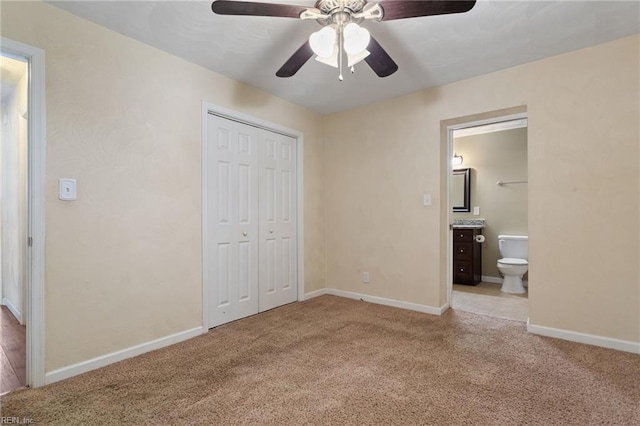 2212 Wildwood Rd, Chesapeake, VA 23323 - unfurnished bedroom with light carpet, a closet, baseboards, ensuite bath, and ceiling fan