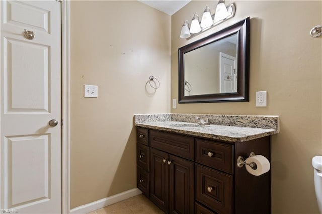 2212 Wildwood Rd, Chesapeake, VA 23323 - half bathroom with vanity, tile patterned floors, and baseboards