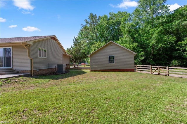 view of yard featuring central AC