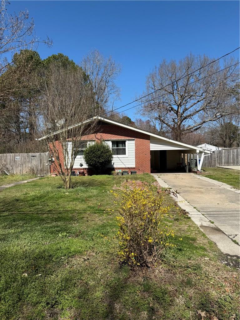 13A Colberts Ln, Newport News, VA 23601 - view of side of property with a carport and concrete driveway
