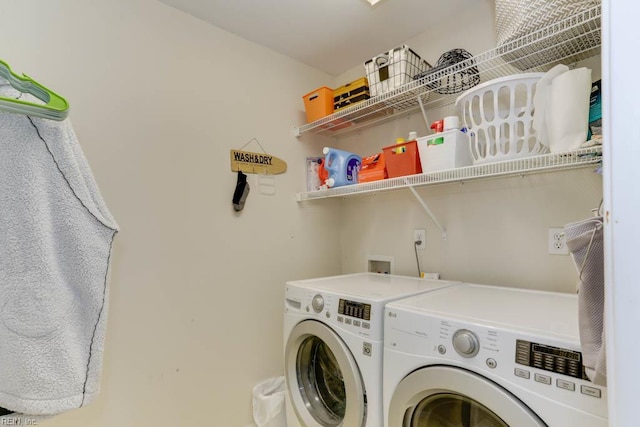 laundry area featuring washing machine and dryer