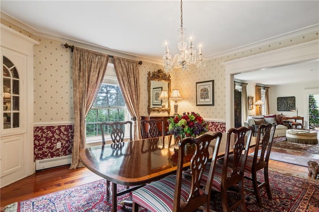 7320 Shirland Ave, Norfolk, VA 23505 - dining space with wallpapered walls, wainscoting, crown molding, baseboard heating, and a chandelier