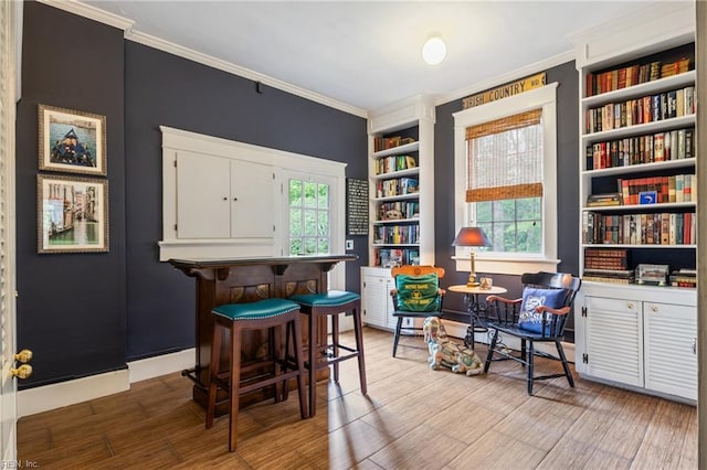 7320 Shirland Ave, Norfolk, VA 23505 - office area featuring ornamental molding, built in features, wood finished floors, and baseboards