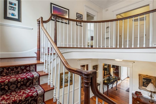 7320 Shirland Ave, Norfolk, VA 23505 - staircase with wood finished floors and ornamental molding
