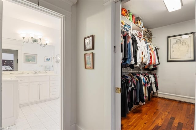 7320 Shirland Ave, Norfolk, VA 23505 - spacious closet with light wood-type flooring