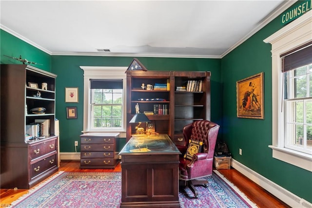7320 Shirland Ave, Norfolk, VA 23505 - office space with baseboard heating, wood finished floors, crown molding, and baseboards