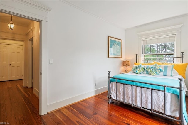 7320 Shirland Ave, Norfolk, VA 23505 - bedroom featuring ornamental molding, hardwood / wood-style floors, and baseboards