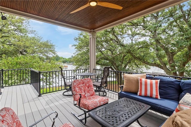 7320 Shirland Ave, Norfolk, VA 23505 - wooden terrace with a ceiling fan and an outdoor hangout area