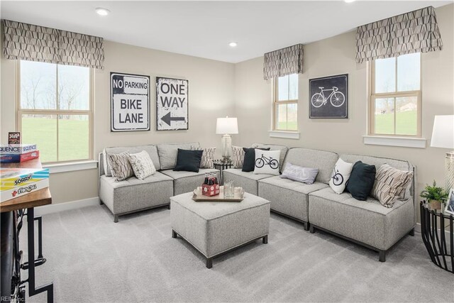 1129 Egret Ln, Suffolk, VA 23434 - living room featuring light colored carpet, recessed lighting, and baseboards