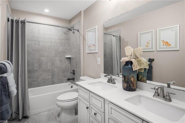 1129 Egret Ln, Suffolk, VA 23434 - full bathroom with toilet, shower / bathtub combination with curtain, double vanity, and recessed lighting