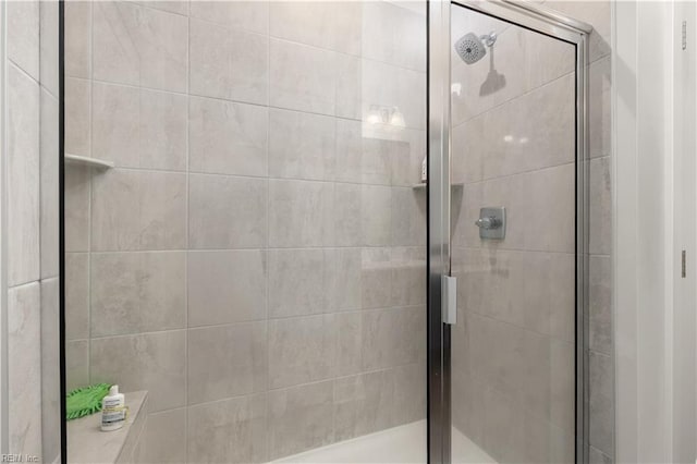bathroom with a stall shower
