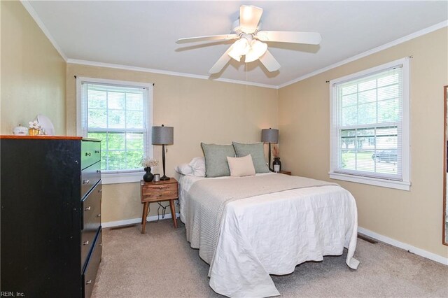 104 Hodges Manor Rd, Portsmouth, VA 23701 - bedroom featuring crown molding, baseboards, light carpet, and a ceiling fan