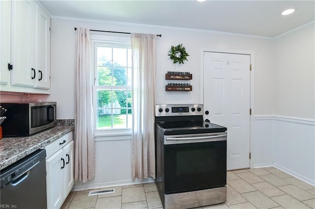 104 Hodges Manor Rd, Portsmouth, VA 23701 - kitchen with appliances with stainless steel finishes, white cabinets, stone counters, crown molding, and baseboards