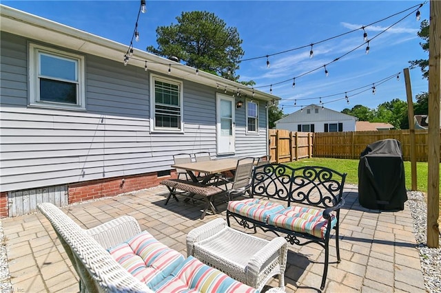 104 Hodges Manor Rd, Portsmouth, VA 23701 - fenced backyard with a patio area, area for grilling, an outdoor living space, and outdoor dining area