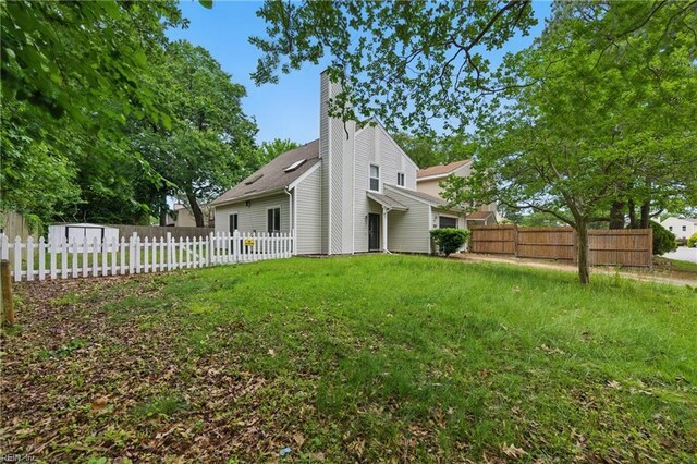 1815 Rich Ct, Virginia Beach, VA 23464 - rear view of property featuring a chimney