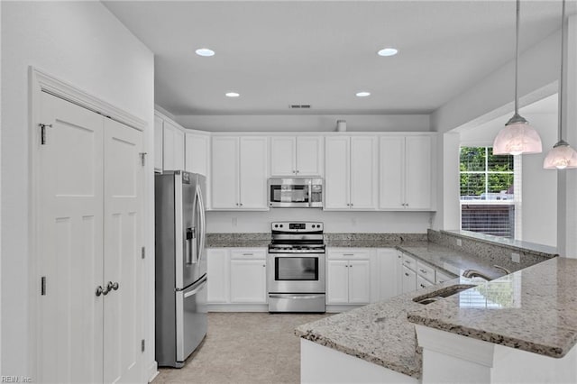 208 Mayberry Ct, Newport News, VA 23601 - kitchen with appliances with stainless steel finishes, a peninsula, white cabinetry, and recessed lighting