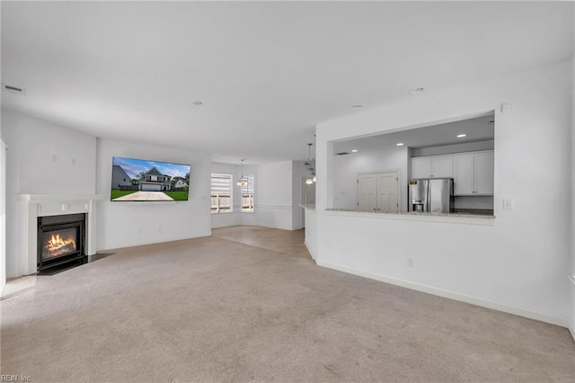 208 Mayberry Ct, Newport News, VA 23601 - unfurnished living room featuring light colored carpet, a fireplace with flush hearth, and recessed lighting