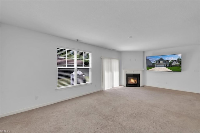 208 Mayberry Ct, Newport News, VA 23601 - unfurnished living room featuring carpet flooring, a fireplace with flush hearth, and baseboards