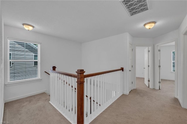 208 Mayberry Ct, Newport News, VA 23601 - hall featuring carpet flooring, baseboards, and an upstairs landing