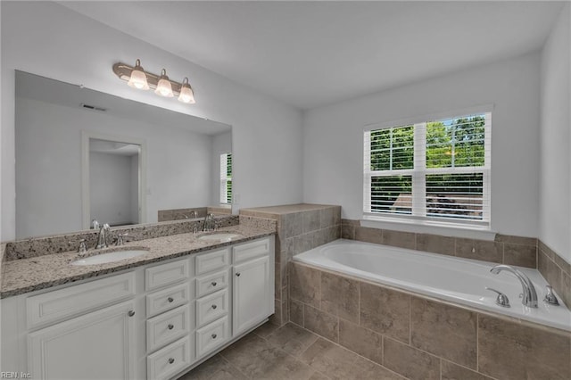 208 Mayberry Ct, Newport News, VA 23601 - bathroom with a garden tub, double vanity, and tile patterned floors