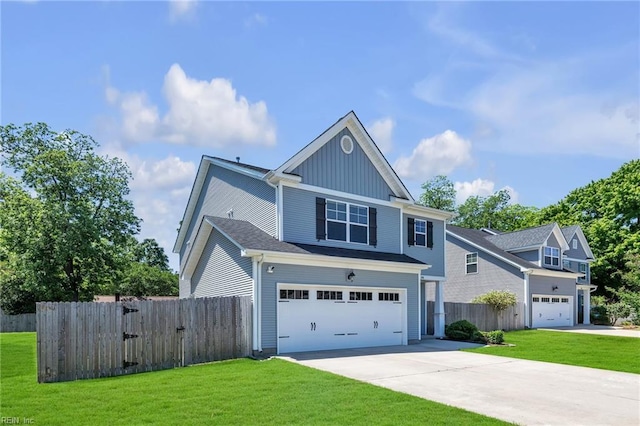 208 Mayberry Ct, Newport News, VA 23601 - view of front of house featuring driveway, an attached garage, and board and batten siding