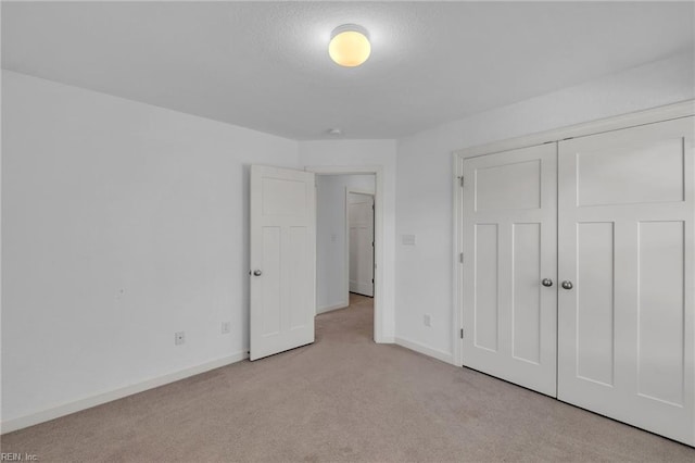208 Mayberry Ct, Newport News, VA 23601 - unfurnished bedroom with carpet flooring, baseboards, and a closet