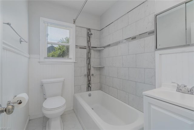 708 Harway Ave, Chesapeake, VA 23325 - bathroom featuring toilet, shower / washtub combination, vanity, a wainscoted wall, and tile patterned floors