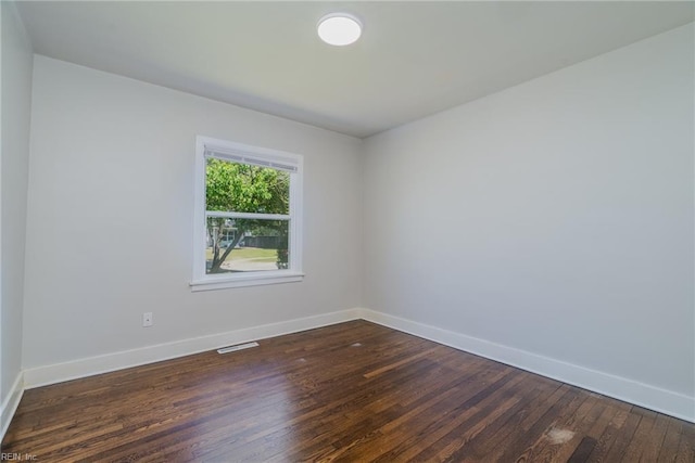 708 Harway Ave, Chesapeake, VA 23325 - spare room with baseboards and dark wood finished floors