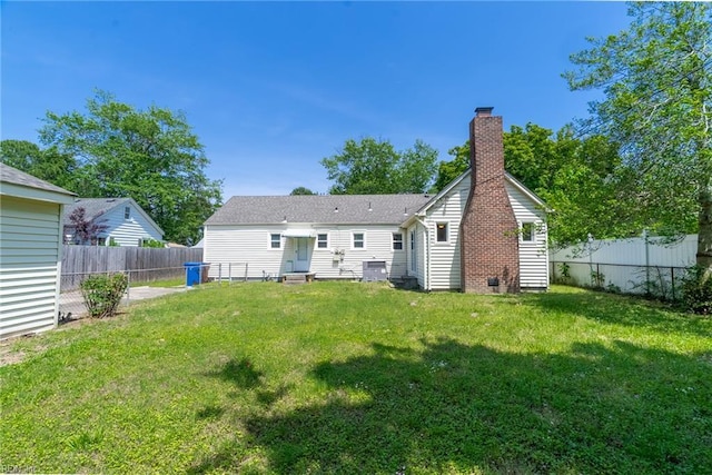 708 Harway Ave, Chesapeake, VA 23325 - back of property with a chimney and entry steps
