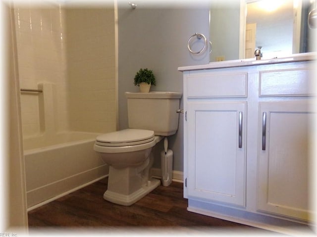 1563 N King St Unit 110, Hampton, VA 23669 - full bath featuring wood finished floors, toilet, baseboards, vanity, and shower / bath combination